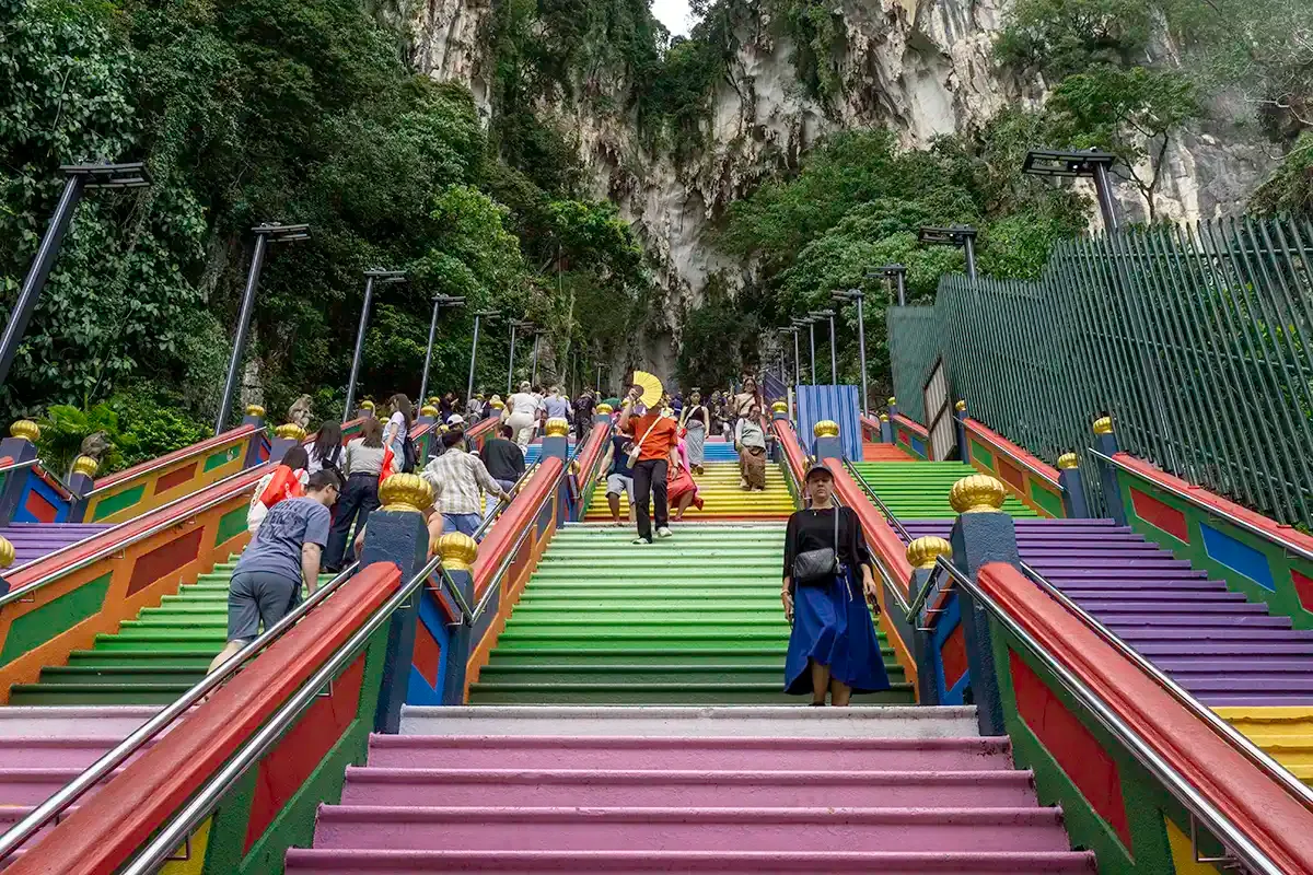 Visitors on the colourful staircase at Batu Caves in Selangor, Malaysia