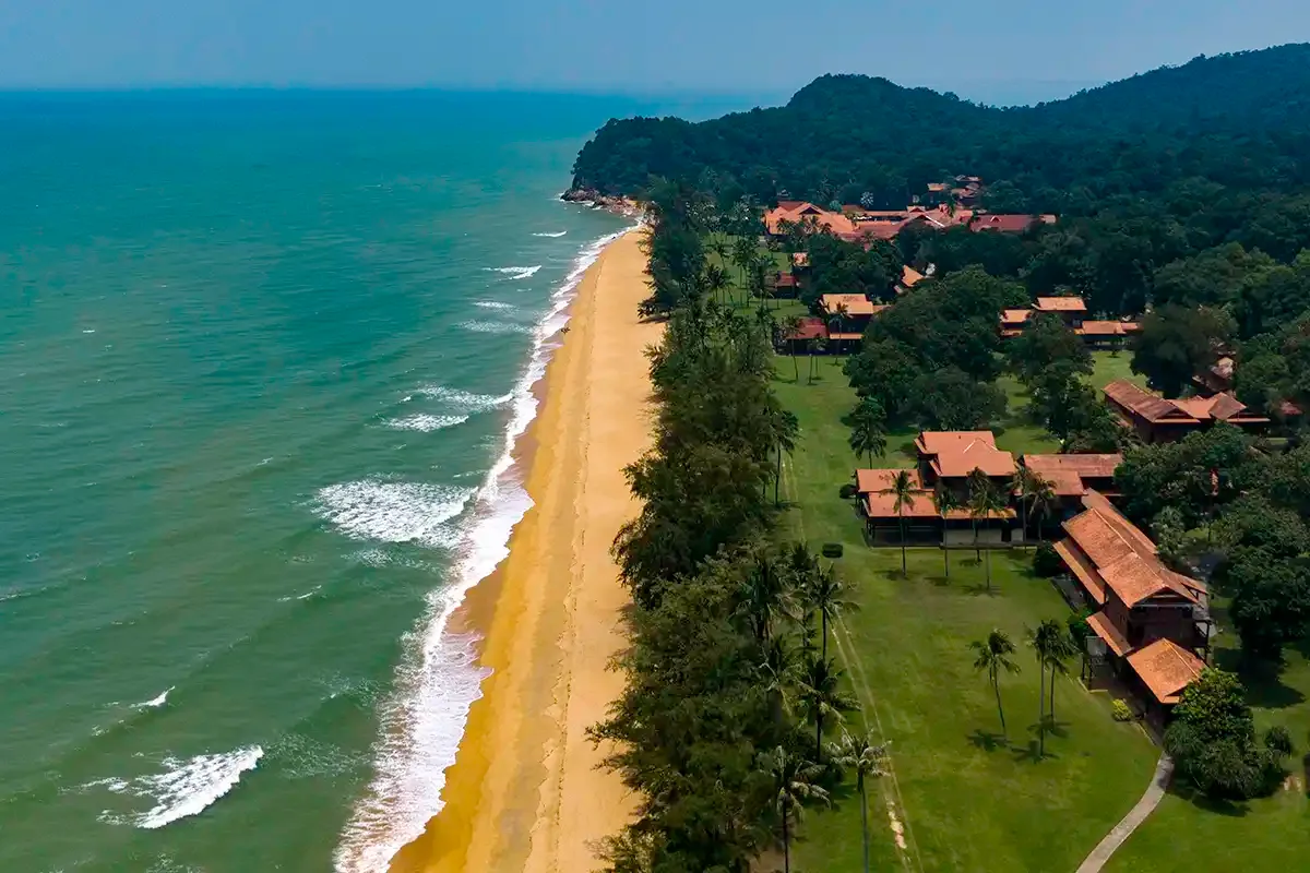 Aerial view of beachfront resort buildings and coastline at Club Med Cherating, Pahang