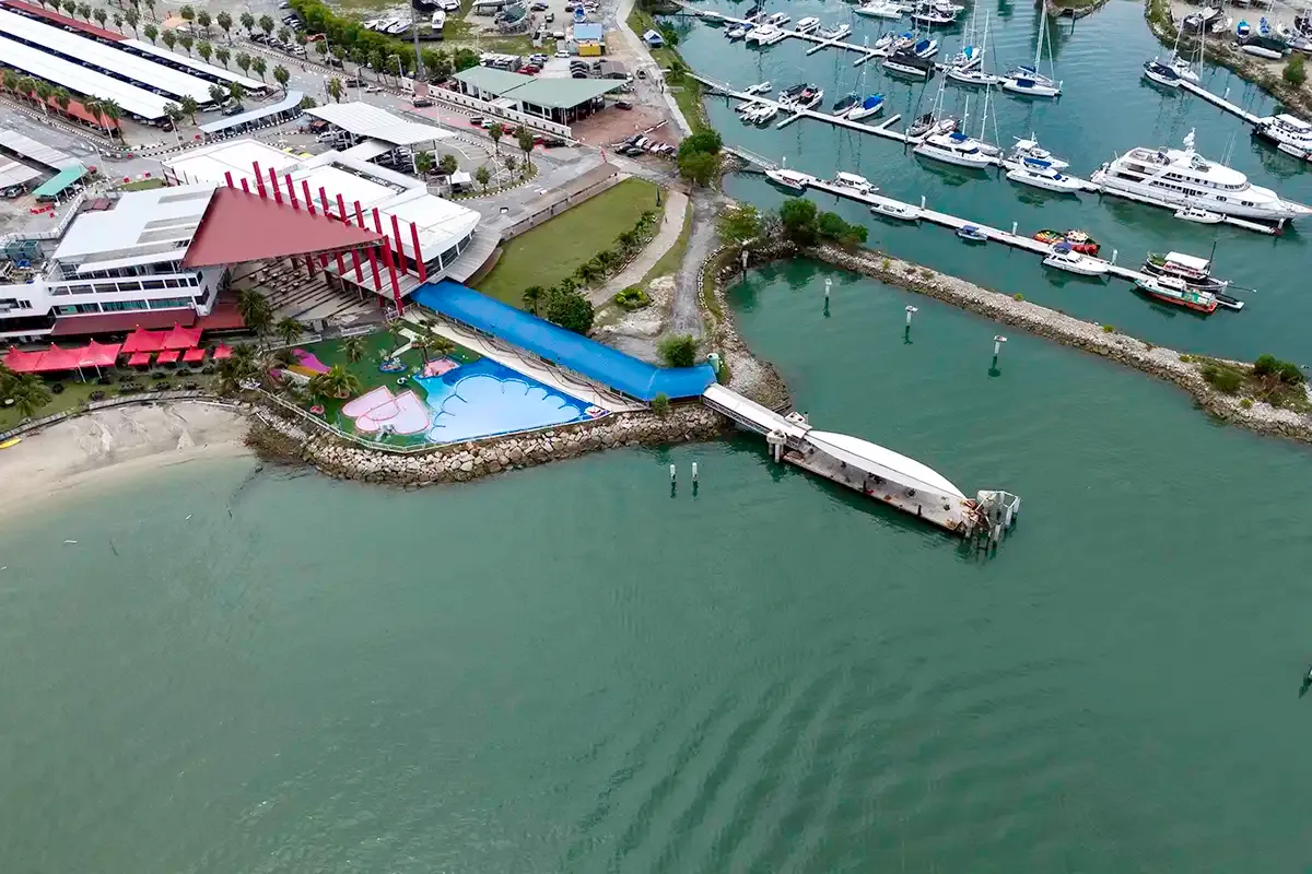 Aerial view of the Marina Island public ferry terminal and marina for ferries to Pangkor Island